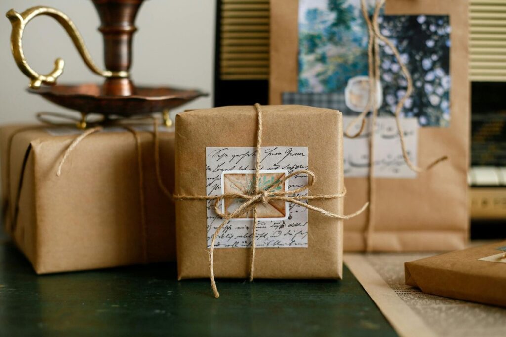 Gifts wrapped in brown kraft paper and tied with twine