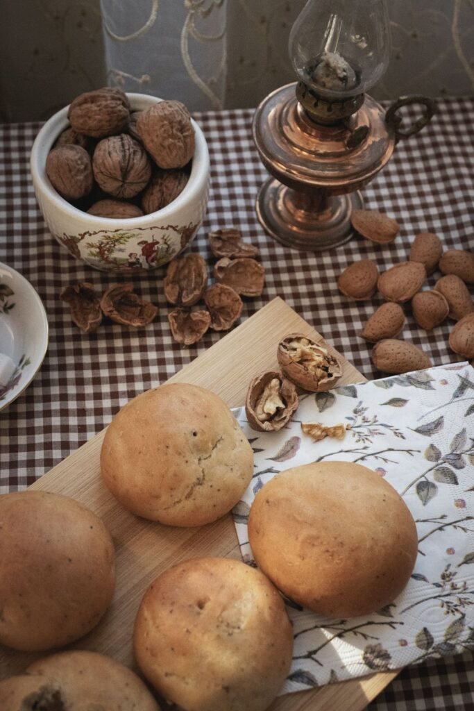 Checkered tablecloth with walnuts and homemade bread