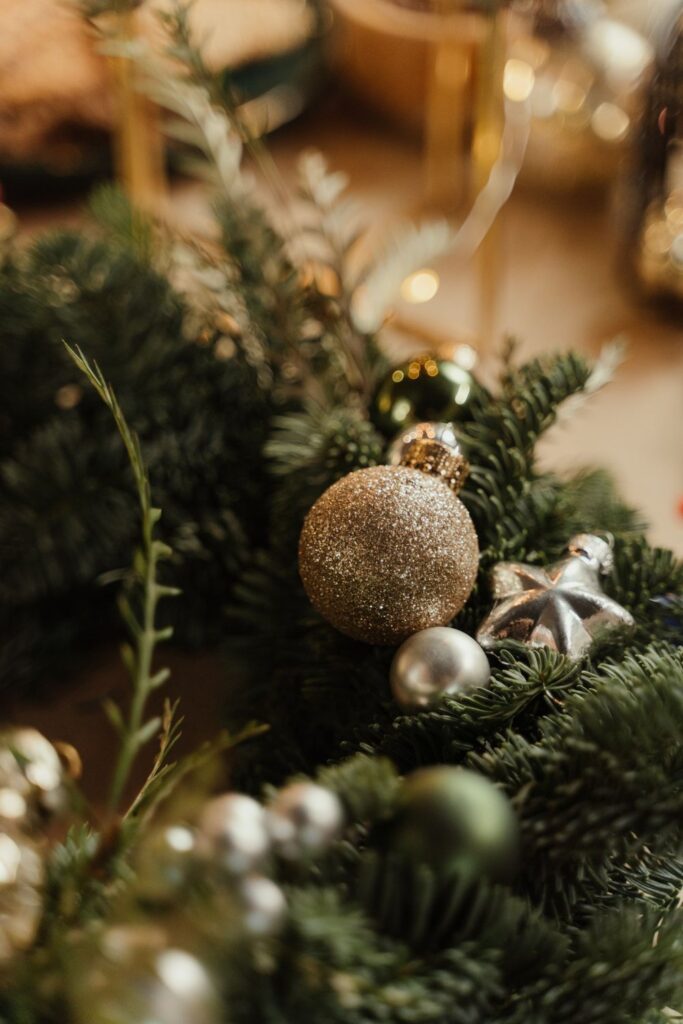 Wreath covered with shimmering silver Christmas ornaments